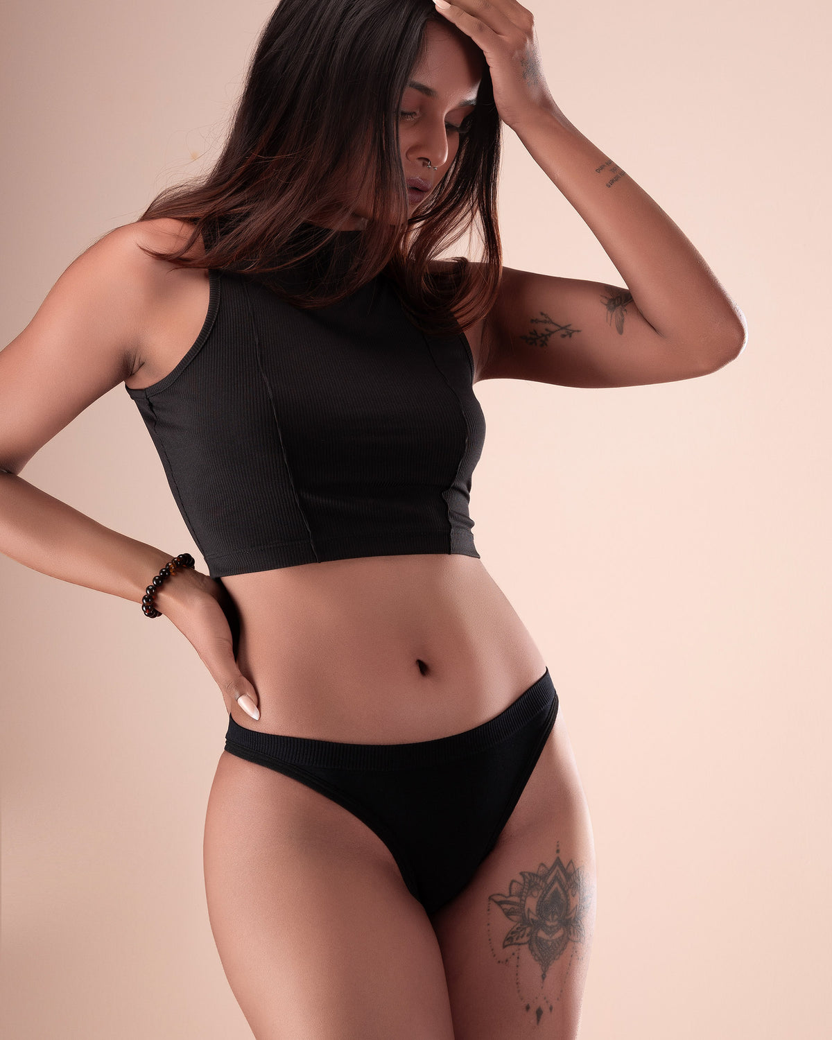 Women's ribbed tanga underwear with a textured finish.
