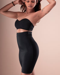 Black high-waisted shapewear skirt shown from an angled front view.
