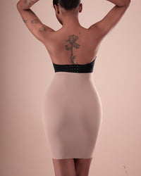Nude high-waisted shapewear skirt shown from the back.